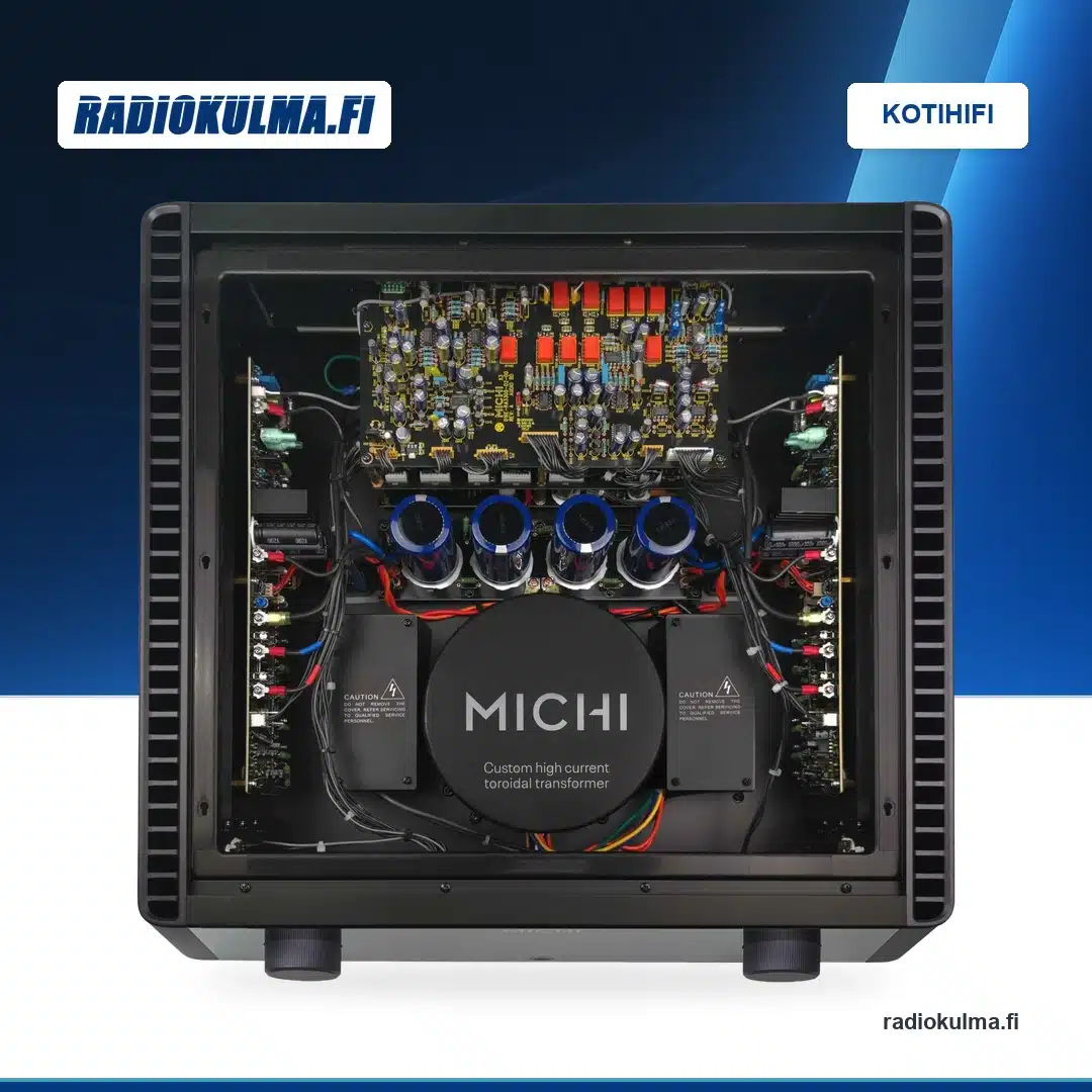 Rotel Michi X3 Series 2 -stereovahvistin ylhäältä kansi poistettuna, muuntaja, kondensaattorit ja piirilevyt näkyvissä.