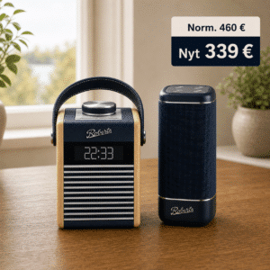 Roberts Rambler Midi Navy Blue -radio ja tumma sininen Roberts Beacon 325 Bluetooth-kaiutin sisustuksellisessa tuotepakettikuvassa.